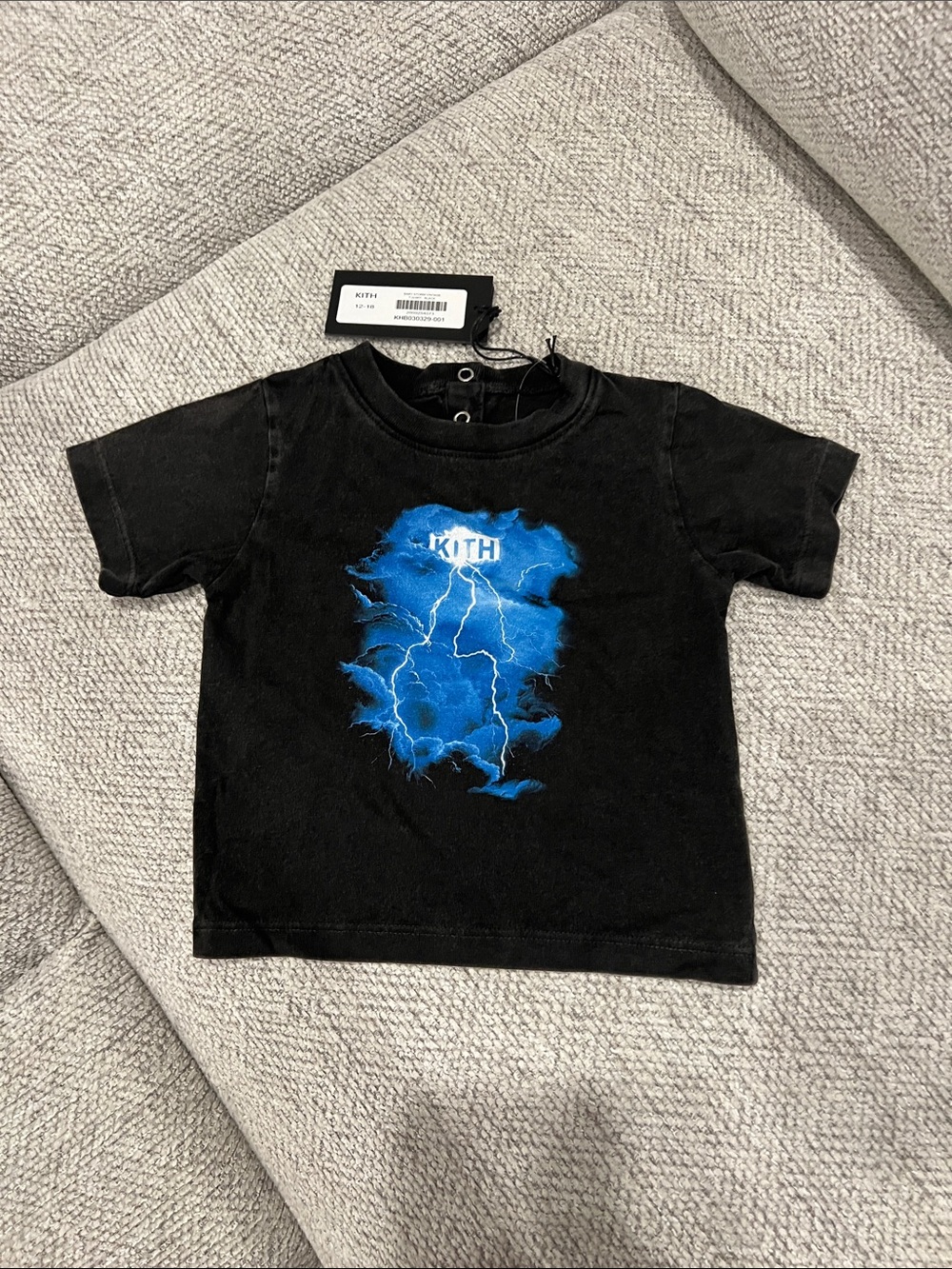 Kith Black Tee with Electric Blue Lightning Graphic